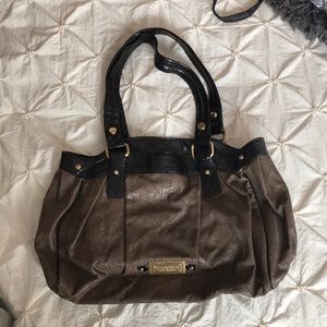 Brown and black Vera Wang hang bag.